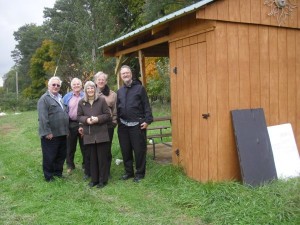 US JPIC Committee Members and Staff Visit Shed Dedicated to Darrell Rupiper, OMI on the CSA at Godfrey, IL
